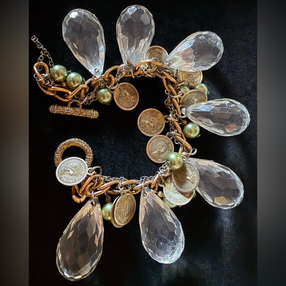 Elegant Gold and Silver Charm Bracelet